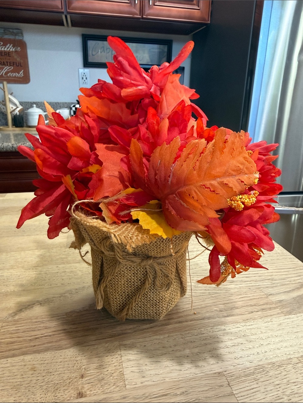 Festive Red & Orange Faux Floral Arrangement in Burlap Pot